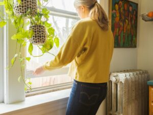 lady open window slightly