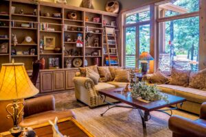 cosy home interior with bookcases, rugs and windows